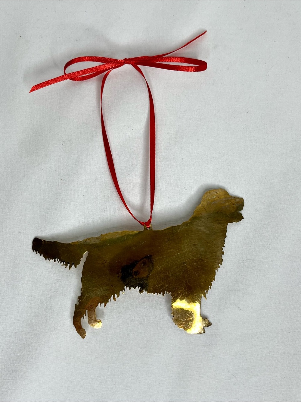 Brass Metal Golden Retriever Dog Christmas Ornament with Red Ribbon.